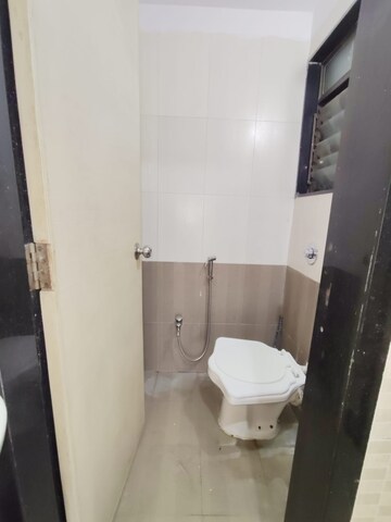 Bathroom in 1 BHK Apartment at Nisarg Hyde Park, Kharghar – for Rent