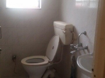 Bathroom in 2 BHK Apartment at Sudhir Avanti, Prabhat Road – for Rent