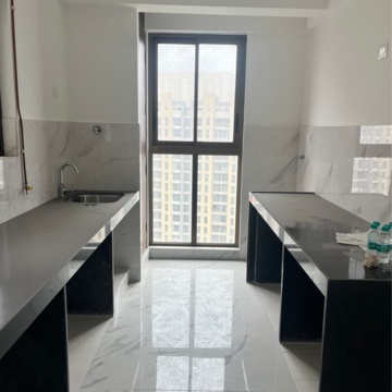 Kitchen in 2 BHK Apartment at Raymond Realty Phase II, Swastik Garden – for Sale