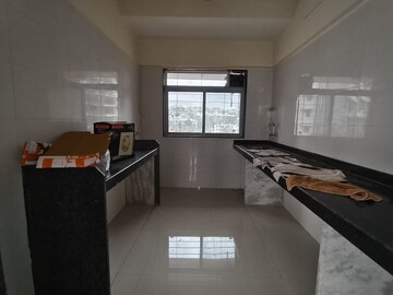 Kitchen in 2 BHK Apartment at Neev Galaxy, Malad East – for Rent