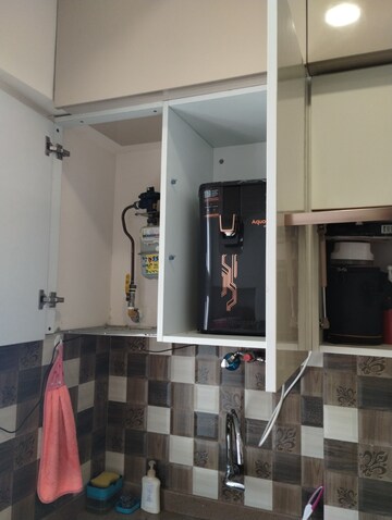 Kitchen in 2 BHK Apartment at Dhaval Sunrise Charkop, Kandivali West – for Rent