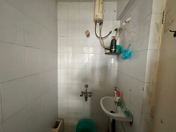 Bathroom in 2 BHK Apartment at Mahalaxmi Nagar – for Rent