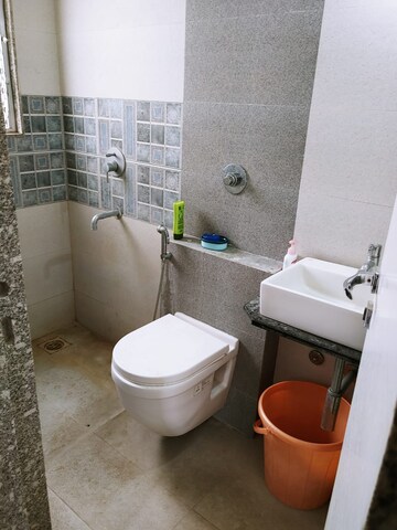 Bathroom in 2 BHK Apartment at Axis Paradigm Whistling Meadows, Paud Road – for Rent