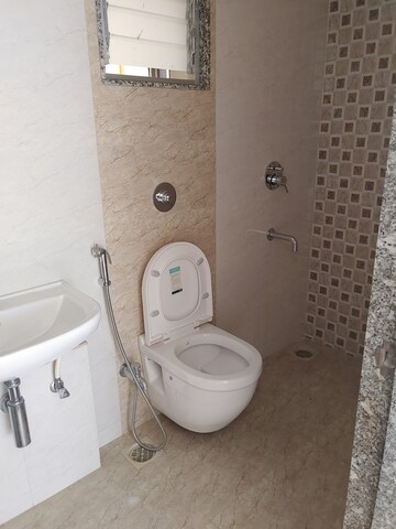 Bathroom in 3 BHK Apartment at Axis Paradigm Whistling Meadows, Paud Road – for Rent