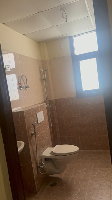 Bathroom in 4 BHK Apartment at Wave City, Wave City – for Sale