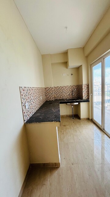 Kitchen in 2 BHK Apartment at Advitya Homes, Sector 143 – for Rent