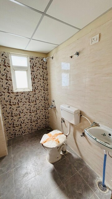 Bathroom in 2 BHK Apartment at Advitya Homes, Sector 143 – for Rent