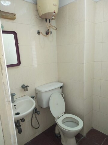 Bathroom in 3 BHK Apartment at Embassy Meadows, Koramangala – for Rent