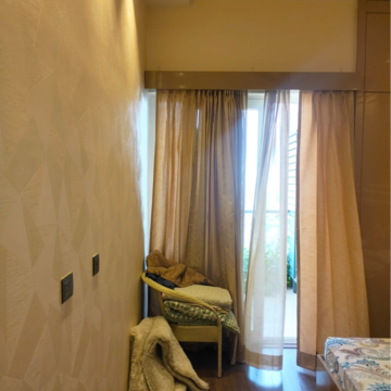 Living Room in 2 BHK Apartment at Supertech Supernova Nova Residences, Sector 94 – for Rent