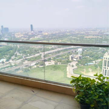 Balcony in 2 BHK Apartment at Supertech Supernova Nova Residences, Sector 94 – for Rent