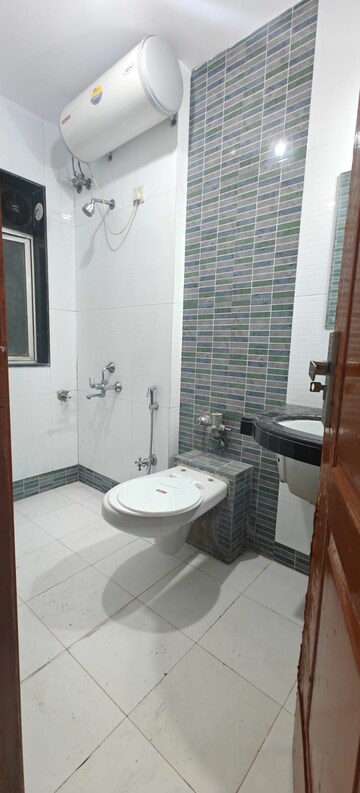 Bathroom in 2 BHK Apartment at Aditya Vardhan Apartment, Powai – for Sale