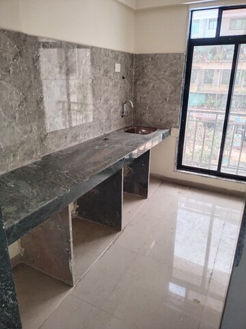 Kitchen in 2 BHK Apartment at Swaraj Heights, Karanjade – for Rent