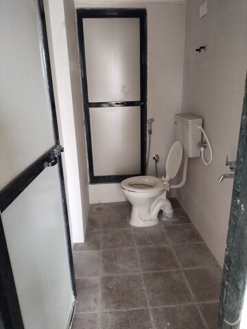 Bathroom in 2 BHK Apartment at Swaraj Heights, Karanjade – for Rent