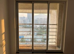 Room in 2 BHK Apartment at Puranik Capitol, Ghodbunder Road – for Sale
