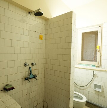 Bathroom in 1 RK Builder Floor at Defence Colony – for Rent