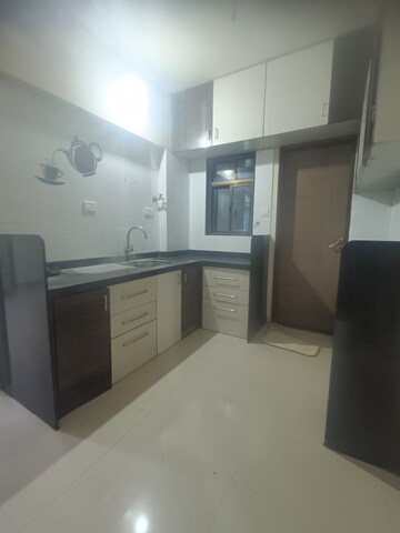 Kitchen in 2 BHK Apartment at Panama Silver Stone, Handewadi – for Rent