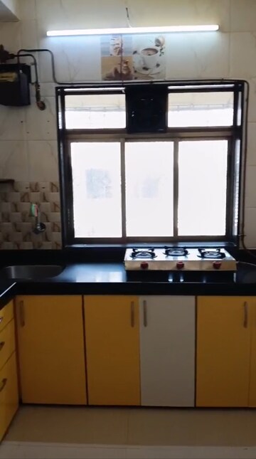 Kitchen in 2 BHK Apartment at Raj Umang 2, Dahisar East – for Rent