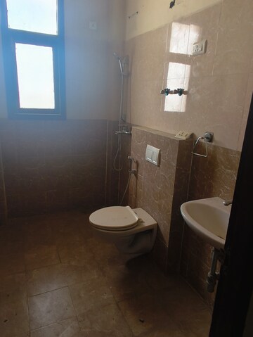 Bathroom in 4 BHK Apartment at Wave City, Wave City – for Rent