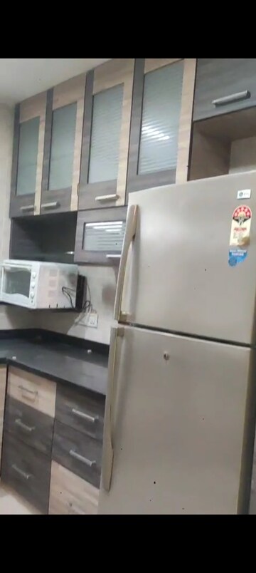 Kitchen in 2 BHK Apartment at Marble Arch Apartment, Andheri West – for Rent