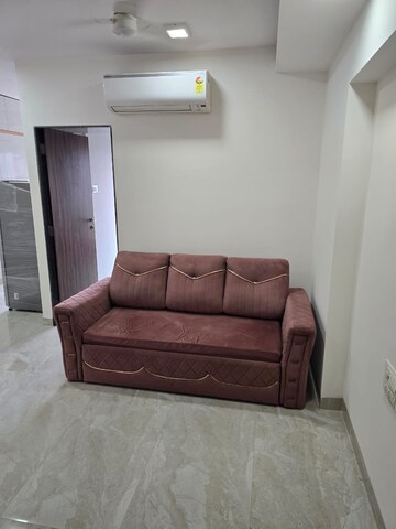 Living Room in 1 BHK Apartment at Platinum Life, Andheri West – for Rent