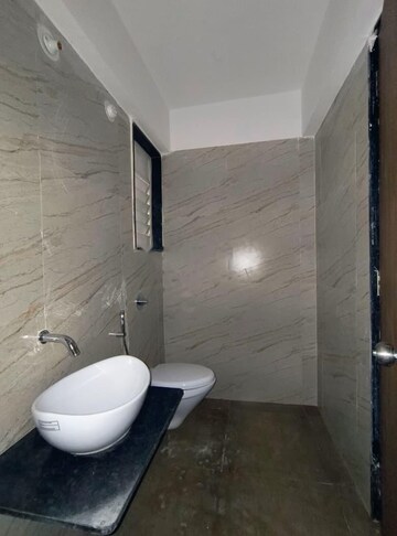 Bathroom in 2 BHK Apartment at Triaa Kosmic Kourtyard, Wagholi – for Rent