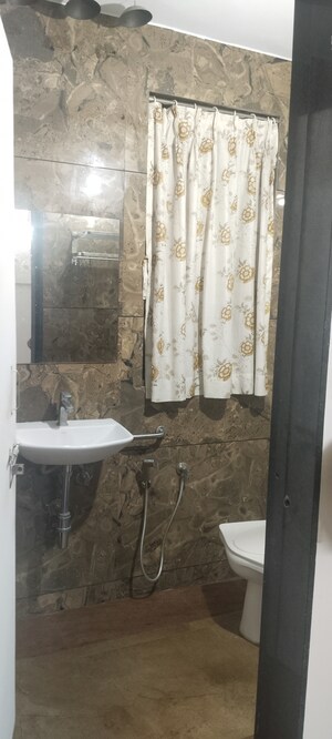 Bathroom in 3 BHK Apartment at Vastrapur – for Sale