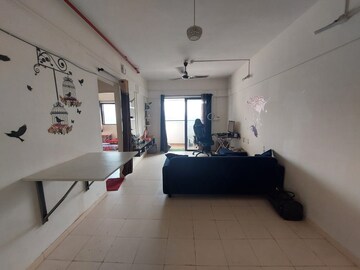 Living Room in 1 BHK Apartment at Rakshak Nagar Gold, Kharadi – for Rent
