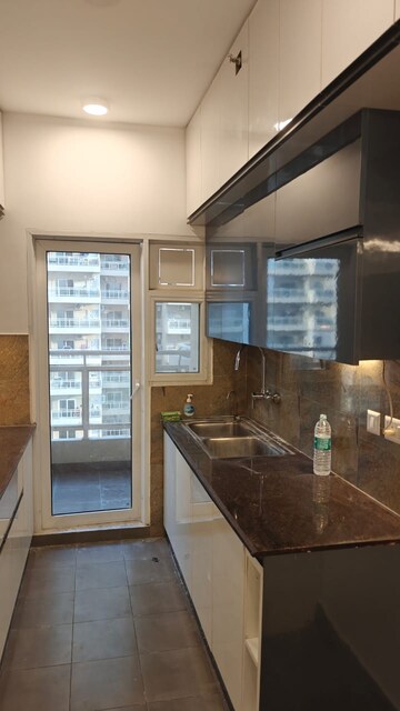 Kitchen in 3 BHK Apartment at Elite Golf Green, Sector 79 – for Rent