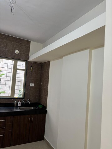 Kitchen in 1 BHK Apartment at Kamdhenu Jasmine CHS, Pimple Saudagar – for Sale