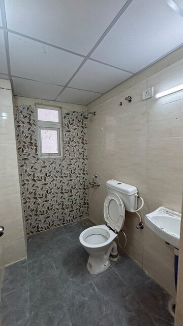 Bathroom in 2 BHK Apartment at Advitya Homes, Sector 143 – for Rent