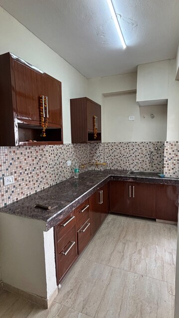 Kitchen in 2 BHK Apartment at Advitya Homes, Sector 143 – for Rent