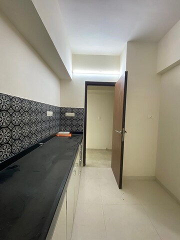 Kitchen in 1.5 BHK Apartment at Lodha Amara, Kolshet Road – for Rent
