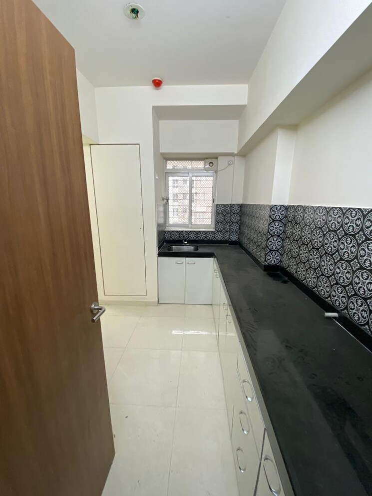 Kitchen, lodha-amara 1.5 Bedroom 650 Sq.Ft. Apartment In Kolshet Road Thane 9162293