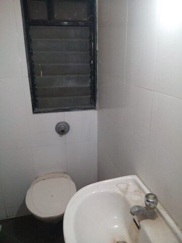 Bathroom in 2 BHK Apartment at Puranik City Reserva, Ghodbunder Road – for Rent