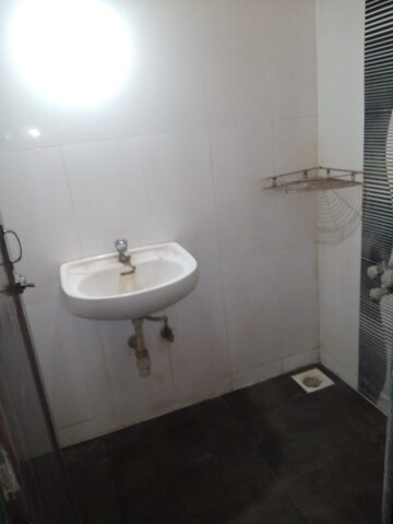 Bathroom in 2 BHK Apartment at Puranik City Reserva, Ghodbunder Road – for Rent