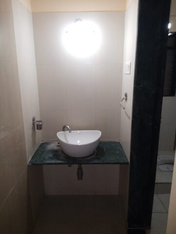 Bathroom in 2 BHK Apartment at Puranik City Reserva, Ghodbunder Road – for Rent
