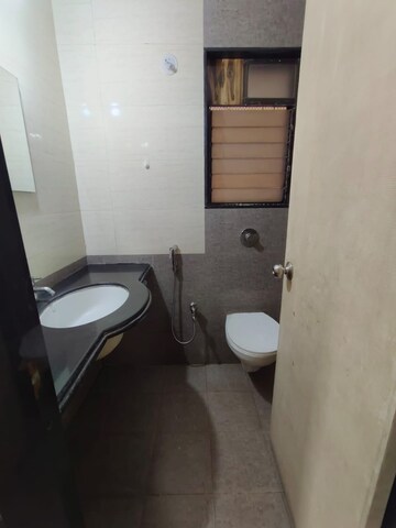 Bathroom in 2 BHK Apartment at Nisarg Hyde Park, Kharghar – for Rent