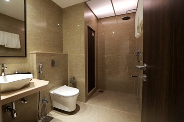 Bathroom in 4 BHK Apartment at Kalpataru Sparkle, Bandra East – for Rent