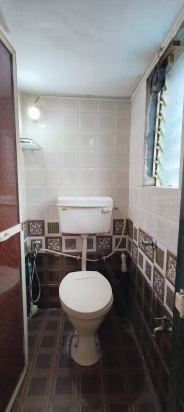 Bathroom in 1 BHK Apartment at Devakibai Sadan, Balkum Pada – for Sale