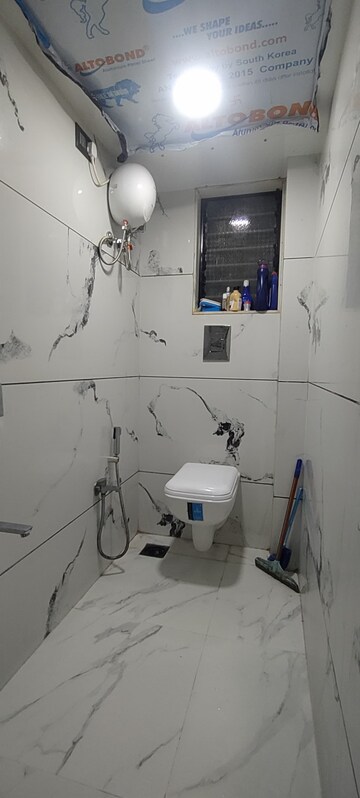 Bathroom in 1 BHK Apartment at Royal Pleasant Park CHS, Malad West – for Rent