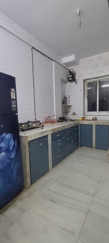Kitchen in 1 BHK Apartment at Royal Pleasant Park CHS, Malad West – for Rent