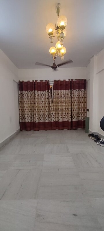 Bedroom in 1 BHK Apartment at Royal Pleasant Park CHS, Malad West – for Rent