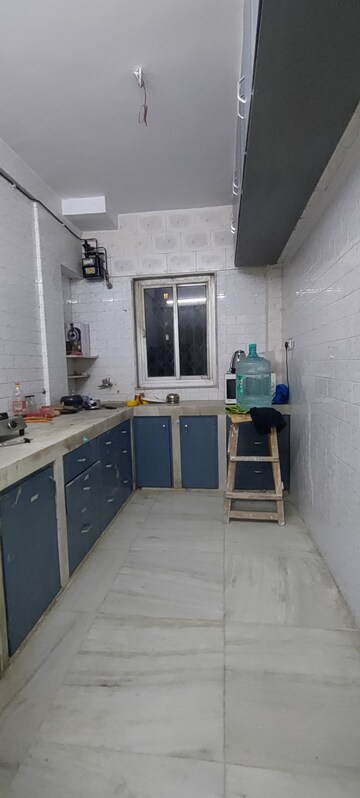 Kitchen in 1 BHK Apartment at Royal Pleasant Park CHS, Malad West – for Rent