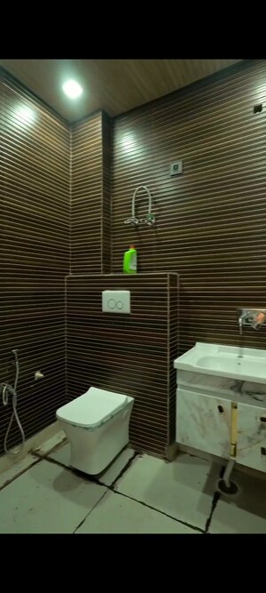 Bathroom in 3 BHK Builder Floor at Dwarka Mor – for Sale