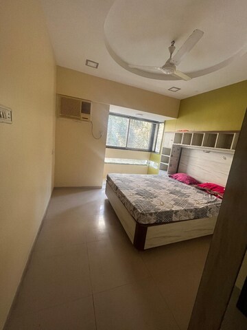 Bedroom in 2 BHK Apartment at Evershine Grandeur, Malad West – for Rent