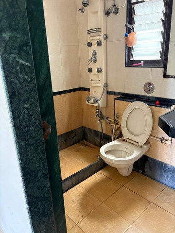 Bathroom in 2 BHK Apartment at Goyal Green Woods, Andheri East – for Rent