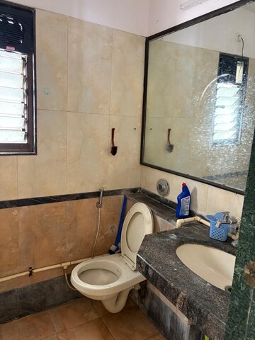 Bathroom in 2 BHK Apartment at Goyal Green Woods, Andheri East – for Rent
