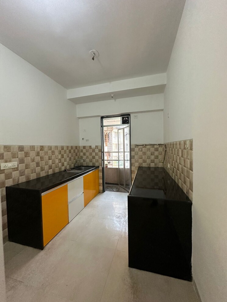 Kitchen, divine-aspen-garden 2 Bedroom 770 Sq.Ft. Apartment In Goregaon East Mumbai 9162450