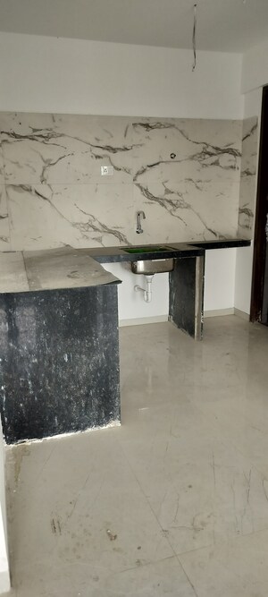 Kitchen in 2 BHK Apartment at Goel Ganga Serio, Kharadi – for Sale