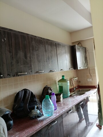 Kitchen in 3 BHK Apartment at Mahagun Moderne, Sector 78 – for Rent